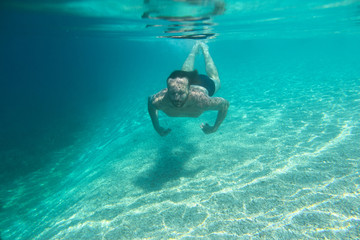 Man swimming underwater