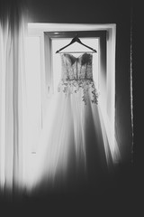 The perfect wedding dress in the room of the bride