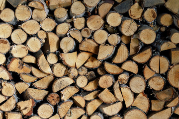 Logs background. Many folded logs close up