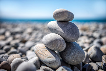 Fototapeta na wymiar sea smooth stones lie on each other near the sea