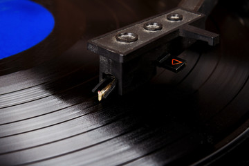 Turntable stylus on a vinyl record