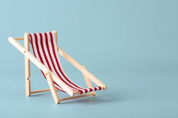Beach lounger on a blue background