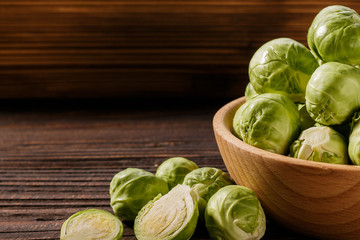 Brussels sprouts on a rustic wooden background