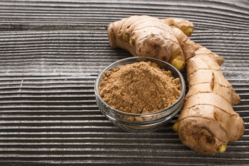 Ginger root on a gray wooden background