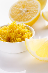 Lemon and juice on a white background