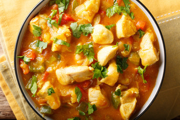 South American Food: Bobo chicken stew with vegetables in coconut milk close-up. horizontal top view