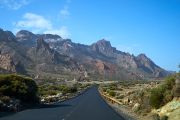The road between volcanic lava. Textured sandstone