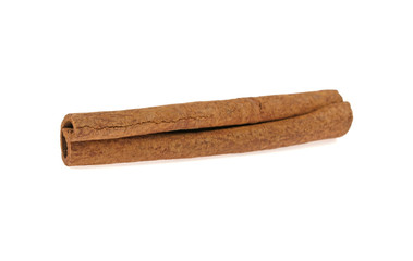 stick of cinnamon on white background