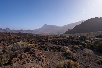 The beautiful view to volcanic lava and sandstone with grass on the Teide Volcano