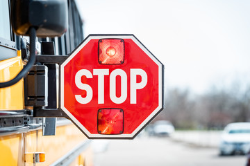 School bus stop sign with flashing lights - 201099302