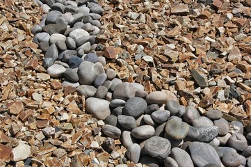Contrasting textures of stones decorate a southwestern yard