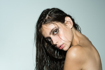 Beautiful girl with naked body, beauty. Woman with soft skin and makeup.