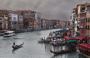 Gondolas mooring line in Canal Grande. Venice, Italy