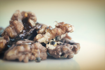 Walnuts and honey still life