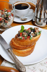 Breakfast with croutons and coffee