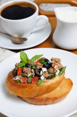 Breakfast with croutons and coffee