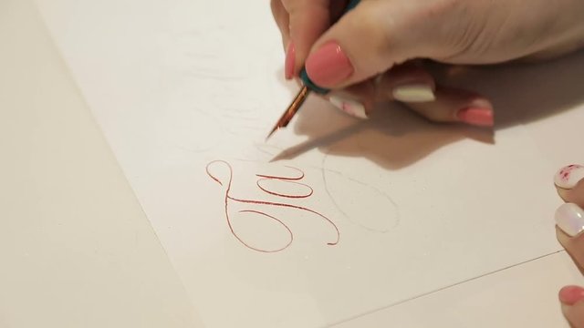 Girl writes calligraphy 1