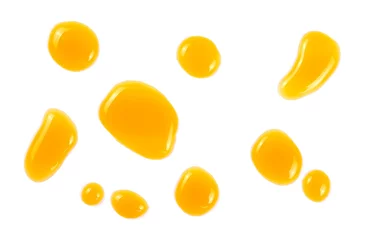 Papier Peint photo Jus Puddle of orange juice isolated on white background, clipping path with top view
