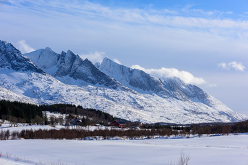 Fototapeta na wymiar Winter view of the mountain range seven sisters in Alstadhaug, Norway.