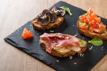 Assorted bruschettas served in restaurant