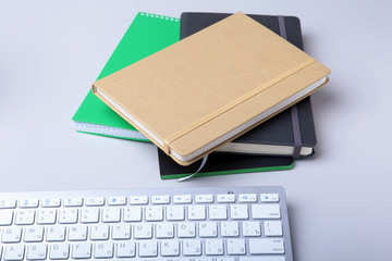 Fototapeta premium Corporate business desktop with laptop, digital tablet, accessories and work equipment. selective focus.