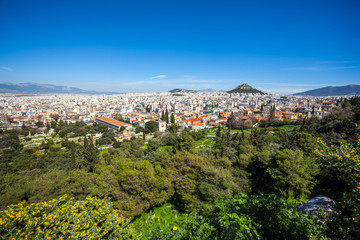 Fototapeta na wymiar Cityscape of Athens and Lycabettus Hill in the background, Athens, Greece