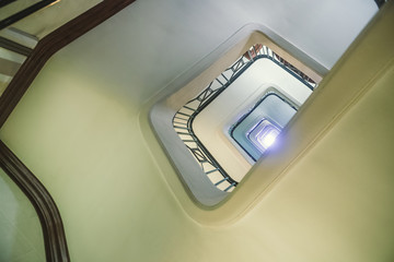 A huge spiral staircase, view from below.