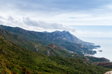 Fototapeta na wymiar A beautiful view to the coastline of Budva riviera and Sveti Stefan island, Montenegro
