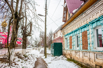 Vysokinichi, Russia - November 2016: Old brick houses in the village of Vysokinichi along Alexander Nevsky Street

