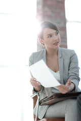 A relaxed conversation of a man and a woman in the office