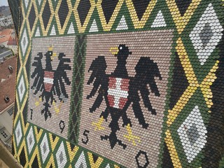 Austrian coat of arms on tile roof of Stephansdom cathedral, Vienna