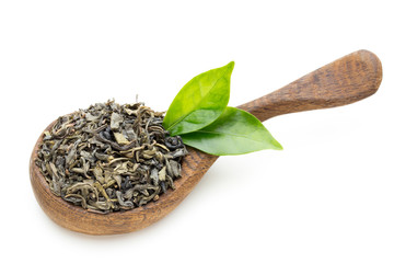 Green tea leaf the spoon isolated on white background.