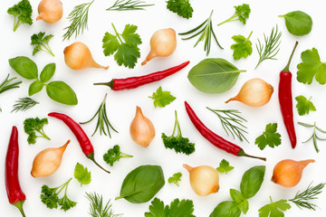 Onion and spices isolated on white background, top view. Wallpaper abstract composition of vegetables.