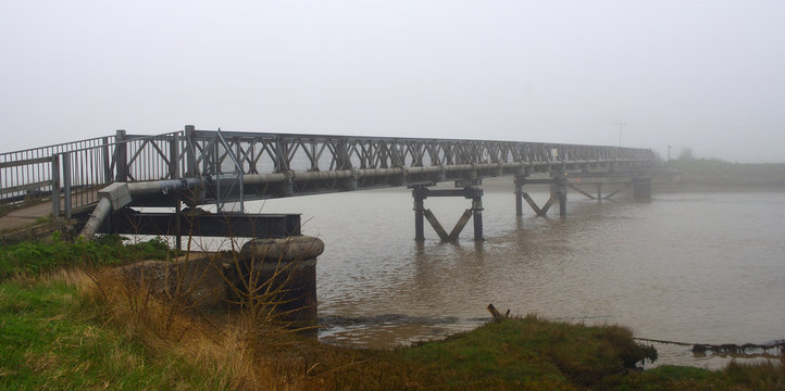 Foot Bridge over the River Blyth in the Fog.