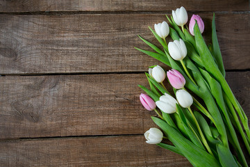 tulips on wooden surface