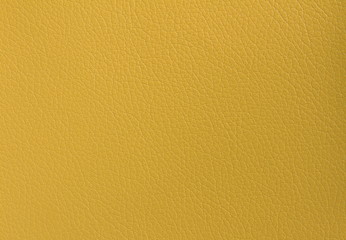 Abstract luxury mustard yellow color leather texture for mustard yellow background presentation and backdrop design purpose