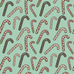 colorful bright sweet delicious candies confectionery red cane sticks on a green mint background vector seamless texture background