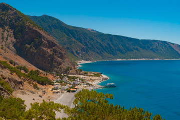 Fototapeta na wymiar Agia Roumeli beach in Chania of Crete, Greece. The village of Agia Roumeli is located at the entrance of the gorge Samaria