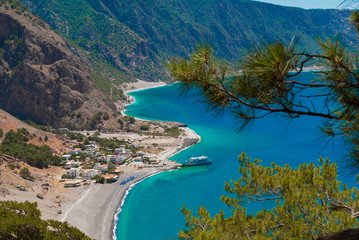 Agia Roumeli beach in Chania of Crete, Greece. The village of Agia Roumeli is located at the entrance of the gorge Samaria