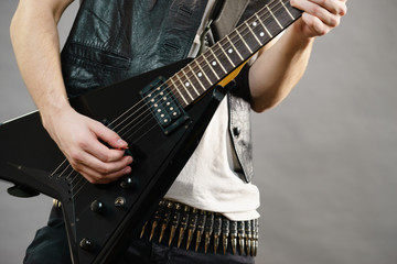 Man playing on electric guitar