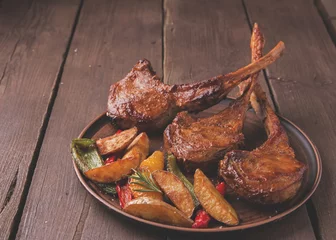 Zelfklevend Fotobehang grilled lamb veal ribs loin with vegetables on a plate © koss13