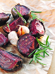 Beet baked with rosemary and garlic on paper