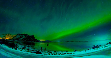 View of Lofoten Islands during winter time is a dream for all landscape photographers. At this time of the year, the colourful and enchanting Aurora Borealis light up the clear night skies