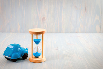 hourglass and toy car