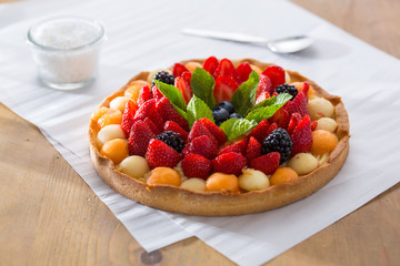 Fruit tartlet on baking pape