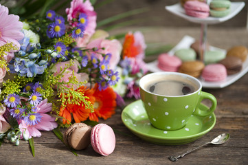 cup of coffee with French biscuit macarons