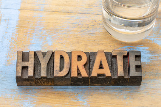 hydrate word abstract in wood type