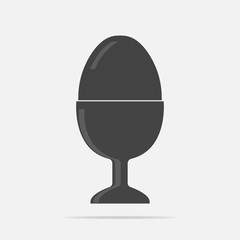 Vector icon egg on a stand. Easter symbol.
