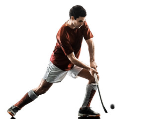 one caucasian field hockey player man isolated silhouette on white background