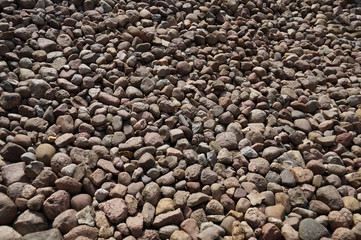 Background composed of thousands of small stones, horizontal frame